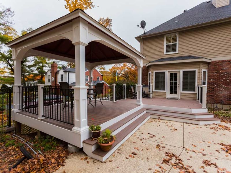 Covered Deck with Deckorators Vault Decking Mesquite White Vinyl Pavilion Wraparound Stairs