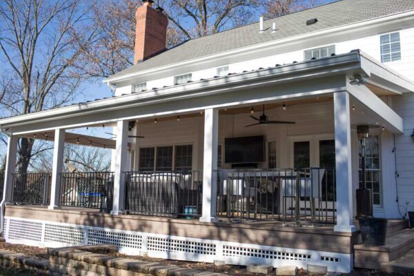 Covered Deck Wood Ceiling White Columns Black Railing