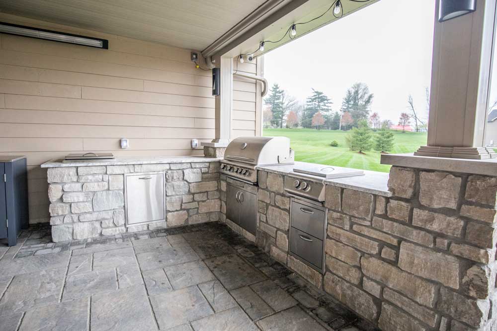 California Custom Decks custom deck and covered patio below and custom outdoor kitchen