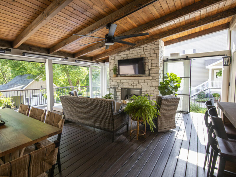 California Custom Decks three season room with retractable windows and fireplace