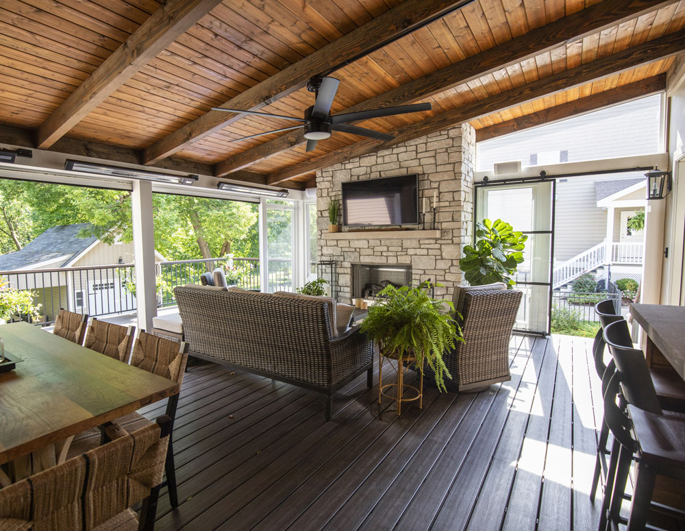 California Custom Decks three season room with retractable windows and fireplace