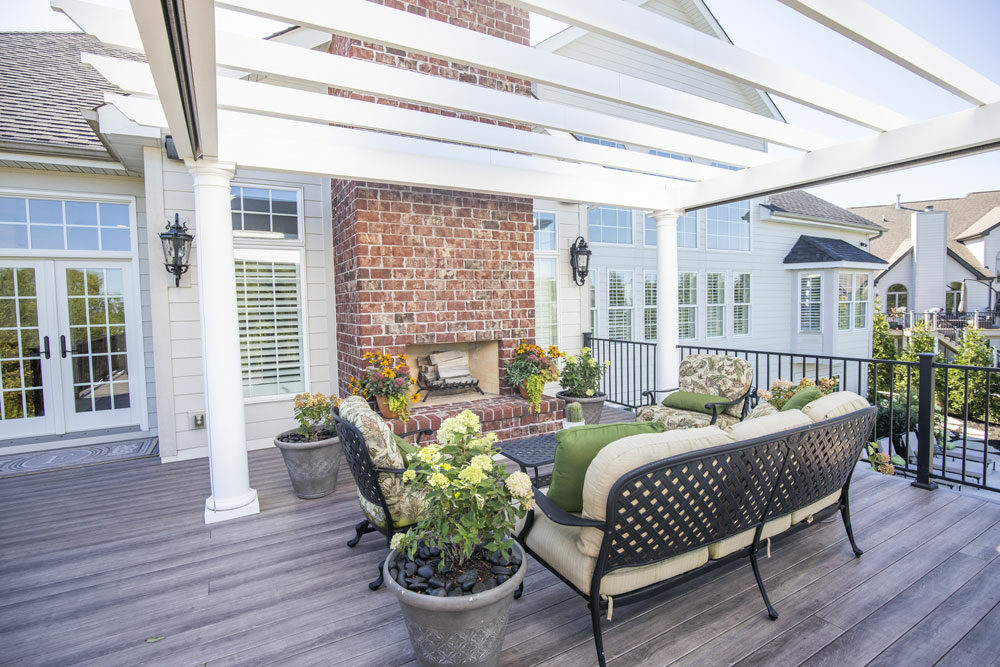 California Custom Decks white pergola and golf simulator three-season sunroom in Chesterfield Missouri