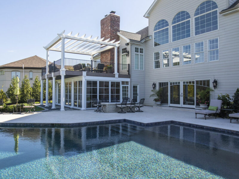 California Custom Decks white pergola and golf simulator three-season sunroom in Chesterfield Missouri