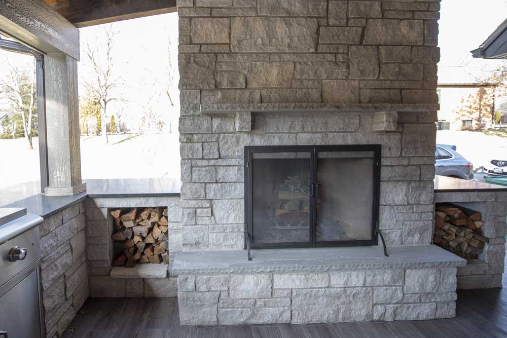 Outdoor fireplaces design - stone wood burning fireplace