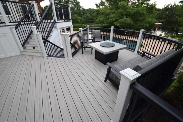 Two-tiered deck overlooking pool in Ballwin, MO