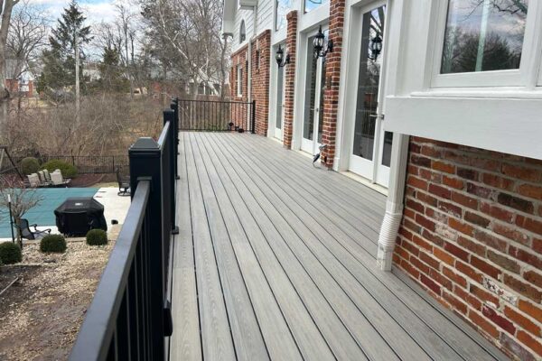 Open deck with black railings in Frontenac, MO