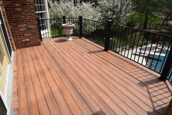 Open deck with black railings in Frontenac, MO
