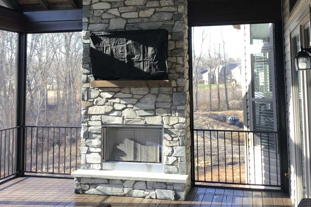 Screen Room with stone fireplace in St. Charles County, MO