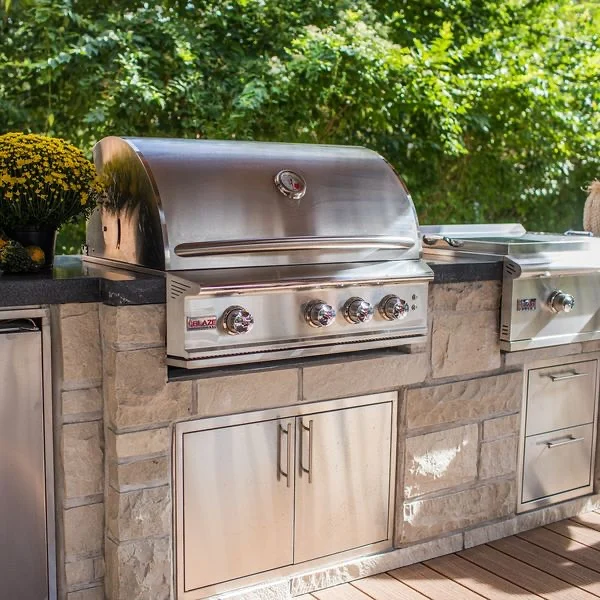 We build spaces that keep you at the center of the action—not stuck inside prepping food while everyone else relaxes!

Our custom outdoor kitchens are designed for real cooking, real connection, and real summer nights that go long✨